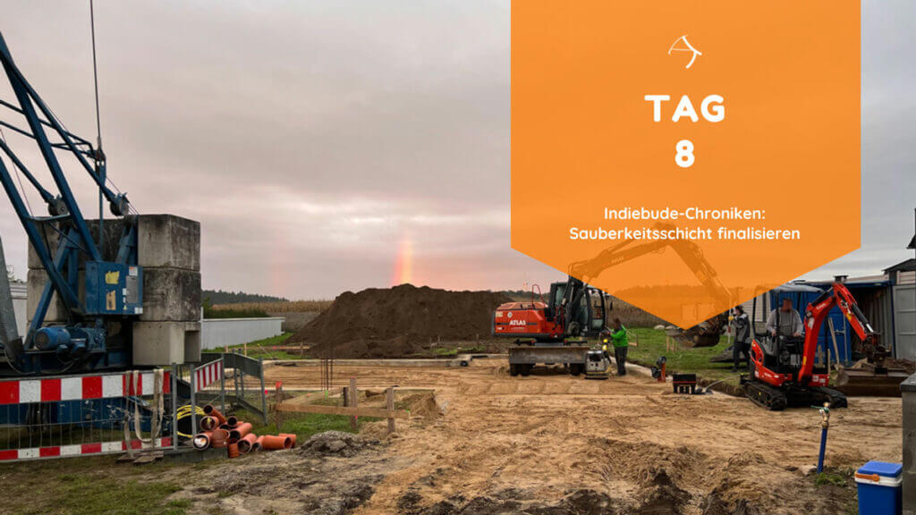 Tag 8 beginnt mit einem Regenbogen besonderer Art. Am Horizont ist ein bunter Streifen gen Himmel. Zeichen für Vielfalt, Spaß, Glück und gute Stimmung? der Bau geht weiter, das Wetter ist heiter.